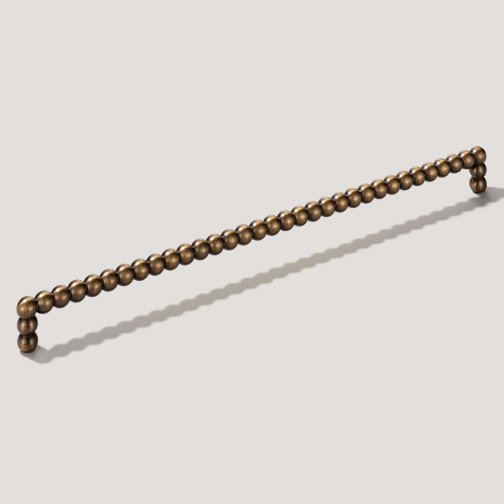 BOBBIN Closet Bar Pull - Antique Brass