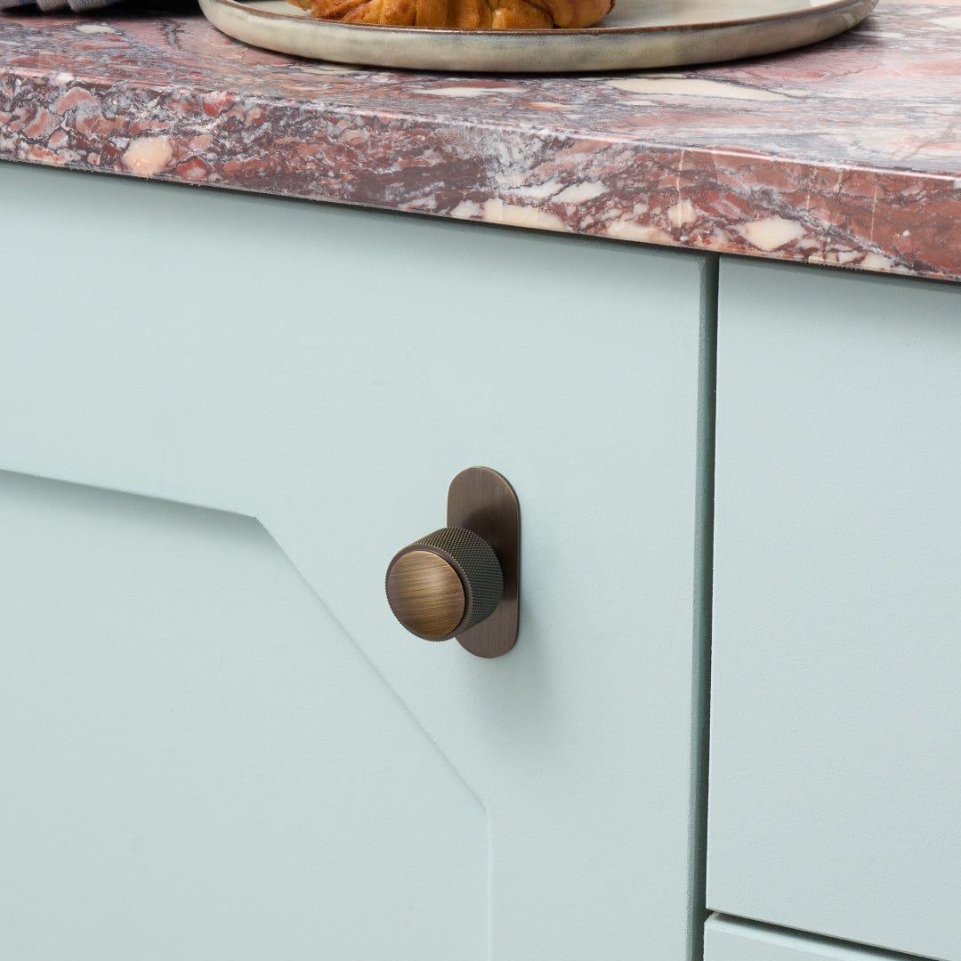 Plank Hardware HUMBOLDT Knurled Button Cabinet Knob - Antique Brass